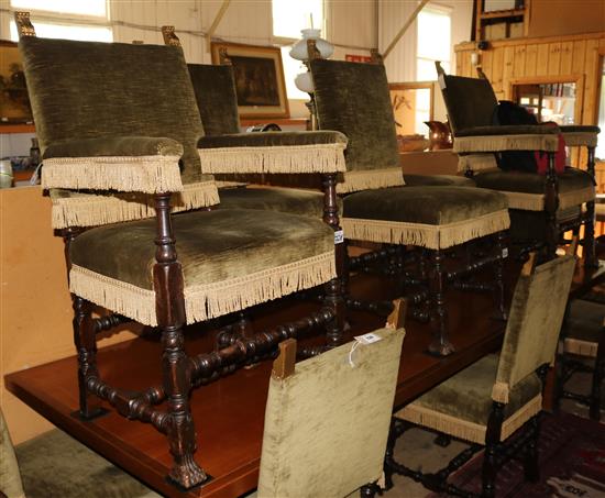 A set of ten late 17th century style carved oak dining chairs including two carvers, H. 3ft 7in.